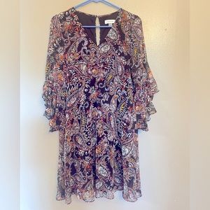 Like new beautiful Calvin Klein dress. Black with multi colors. Gorgeous!